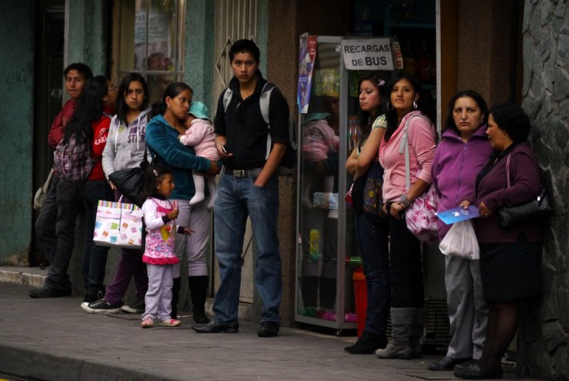 Bus riders, Cuenca, Ecuador, 2011