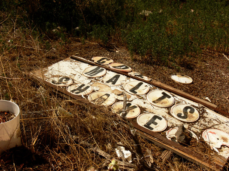 Discarded signage, Snow-Cap Drive-in, Seligman, Arizona, 2006