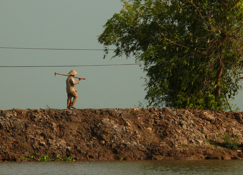 Man with a hoe, somewhere near the Vietnam/Cambodian border, 2008