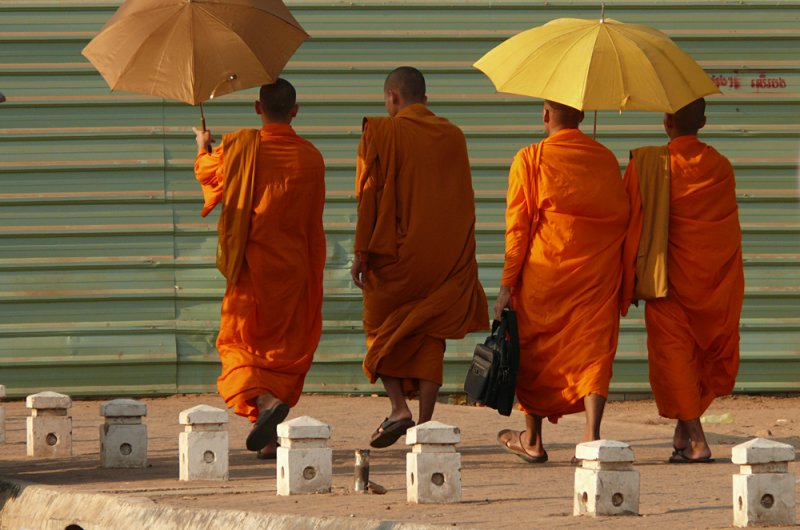 Monks moving on, Phnom Penh, Cambodia, 2008