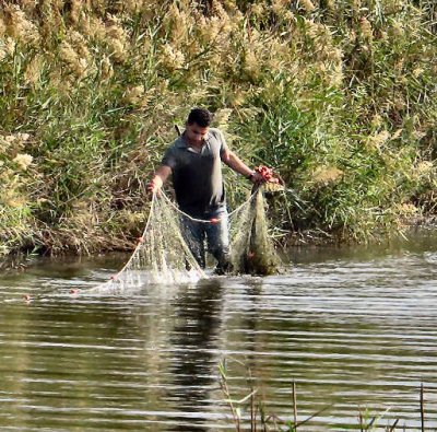 just before throwing the fishing net.jpg