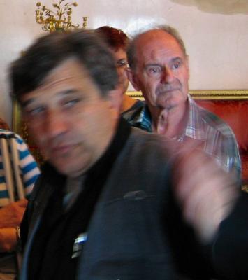 A Tourist Guide Pointing  At  An Object In A Museum .JPG