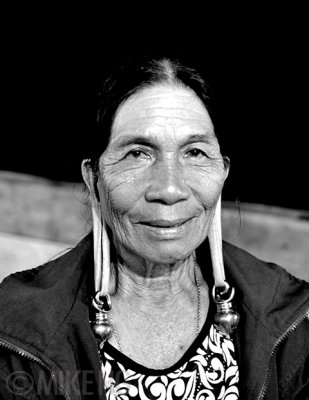 Long-ear-lobed Woman