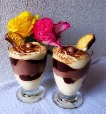 Two middle-aged roses chat over their cups of Tiramisu...