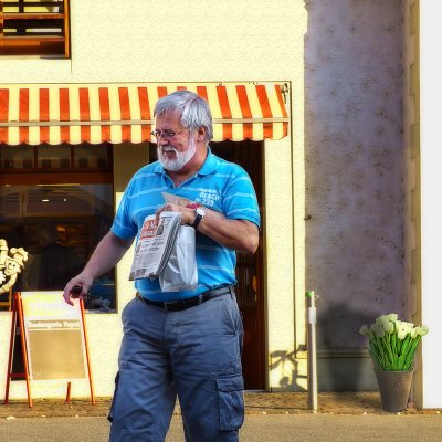 Buying bread and newspapers on sunday it's a man's work....