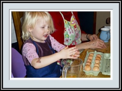 Eloise Cracking An Egg, P1010247.jpg