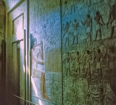 Wall of tomb depicting servants, possessions, and occupations of the deceased - false door is visible on left