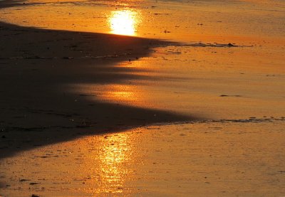 reflet solaire sur le sable