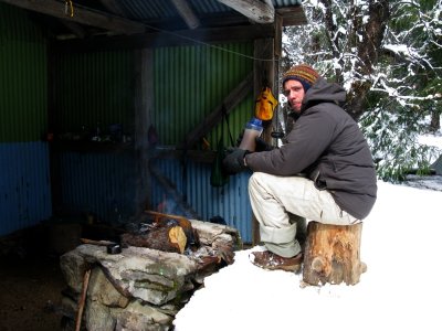 Lee guards the fire with a growl