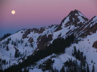 Sunrises and the moon sets on Red Butte