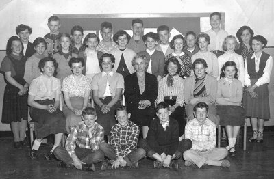 4th row: Annette Morrissette; Leonard Cook; Walter (Fred) Hall; Roxy ?; Richard Musgrove; Dick Morton; Russell Swanky; Clarke Winters; Carol Sirack;
3rd row: Joan Hall; Bev Moon; Marion Willey; Carolynn Dietrich; Dayle Winters; Donna Poole; Diane Pearce; Lorraine Riggs; Mona Wilde; Gail Edwards;
2nd row: Joan Robertson; Iris Hopgood; Linda Anderson; Teacher Madame A. St. Onge; Joyce Laskosky; Glenys Ferguson; Judy Fautley;
1st row: Dennis (Pete) Remillard; Doug MacCurdy; Bill Percy; Jim Dixon;

If able please fill in the blanks and/or provide spelling corrections ... TIA