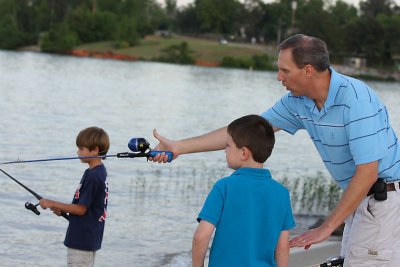 Uncle Nathan teaches David how to cast a line