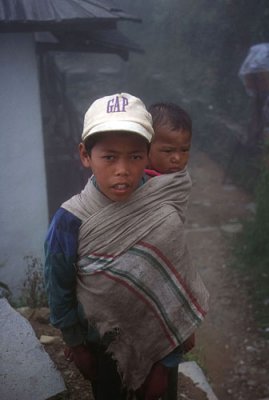 Nepalese boy and baby brother
