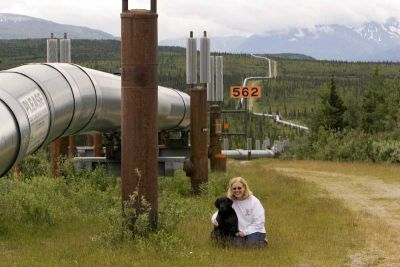 JoAnn and Soama beside the pipeline on the Richardson Highway