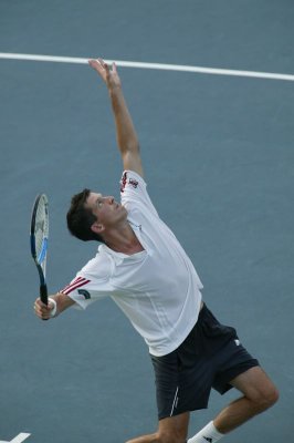 Tim Henman serving