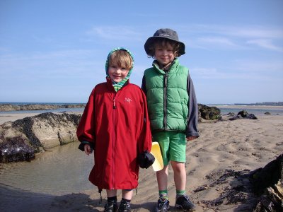 Seahouses beach. And yes, Benjy is wearing Mummy's coat. Long story.