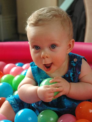 7 months old and playing in a ball pit