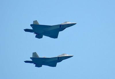 Pair of F-22s over Ft lauderdale beach