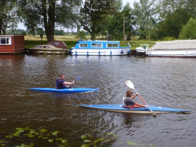 Paddling Past The Waterlilies