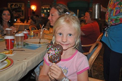 Emma having an ice cream bar at dinner on the ship.jpg