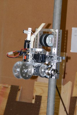 Minibot on pole