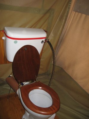 Tent camp flushing toilet