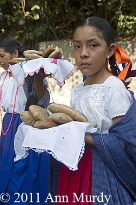 Girl carrying bread