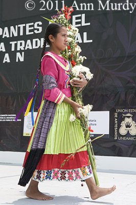 Girl carrying flowers