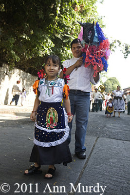 Little girl with Guadalupe apron