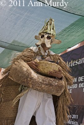 Costume with straw and bone