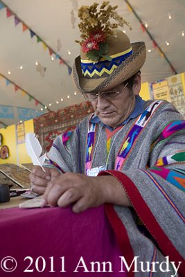 Pompeyo of Peru working in his booth
