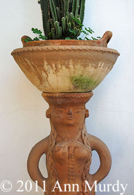 Sculpture with cactus