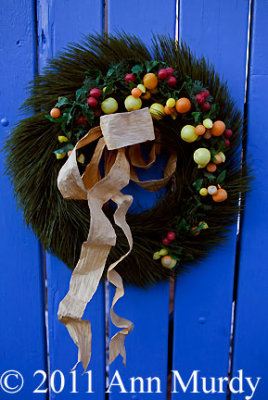 Christmas Wreath against blue gate