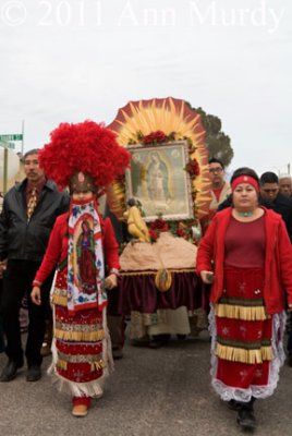 Crystal and Benita carrying anda