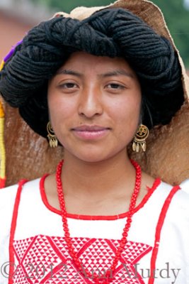 Girl in red and white huipil