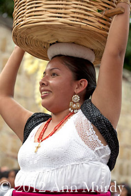 Girl from Tlacolula carrying canasta