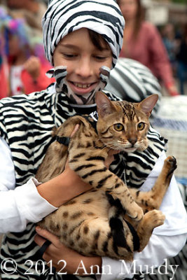 Boy with Bengal Cat