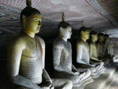 Buddha Images Carved Into The Rock