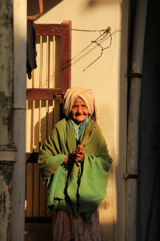 Patan old woman Namaste.jpg