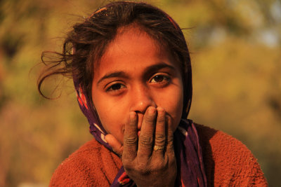 Patan girl with hand.jpg