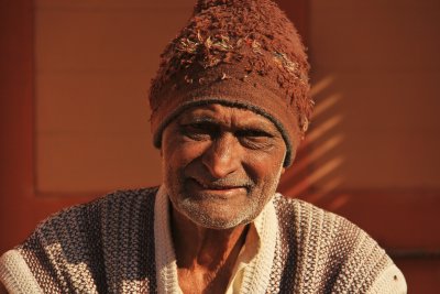 Patan man with hat.jpg