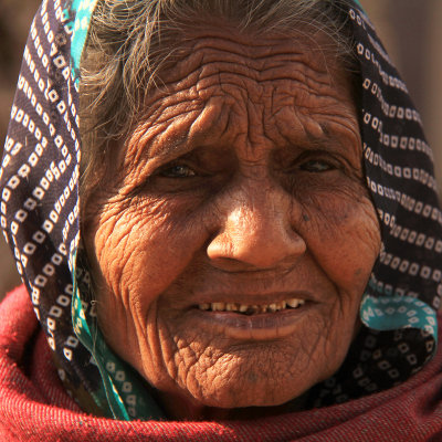Patan old woman square.jpg