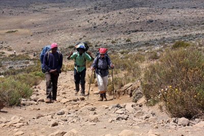 Jola with Eliaoni and Josephat during climbing