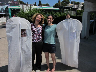Yael and Tami with their dresses for the wedding