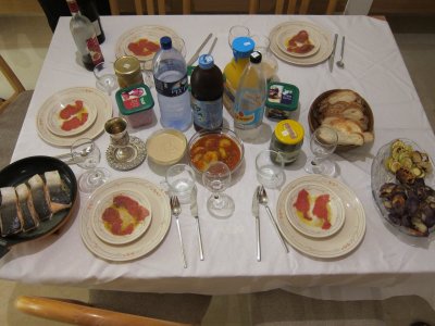 table is set for shabbat dinner-carpaccio and salmon