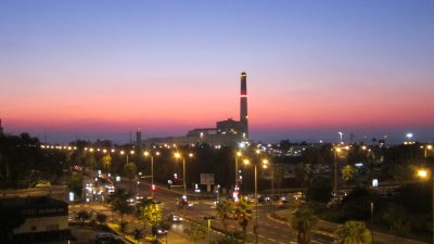 sunset over north Tel Aviv coast-power plant in background