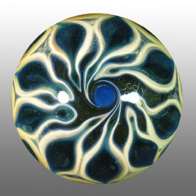 Big C and Little C are ground on to the surface of this many mini vortex marble.  Beautiful swirled pattern on the back.