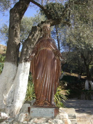 Virgin Mary Statue: on the path to her house.