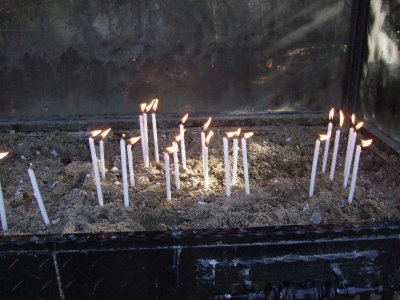 Candles by the house of Mary
