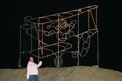 Joann in Front of Lit Up Santa